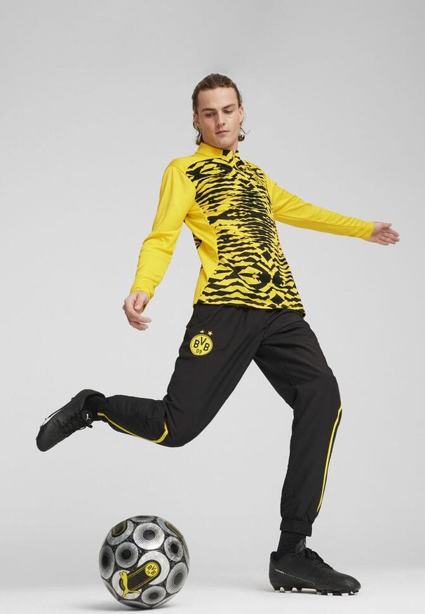 Puma - Męska bluza przedmeczowa z zamkiem 1/4 Borussia Dortmund PUMA. Kolor: czarny, wielokolorowy, żółty