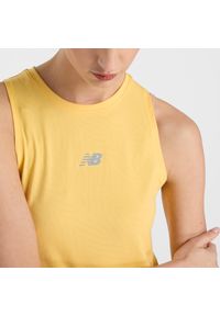 Koszulka damska New Balance WT51252CEE – żółta. Kolor: żółty. Materiał: tkanina, poliester, materiał #2