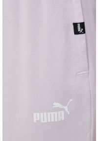Puma spodnie bawełniane 848830 damskie kolor fioletowy z nadrukiem. Kolor: fioletowy. Materiał: bawełna. Wzór: nadruk #4