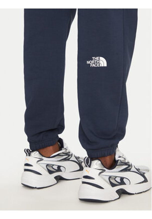 The North Face Spodnie dresowe Simple Dome Light NF0A8C41 Granatowy Regular Fit. Kolor: niebieski. Materiał: bawełna