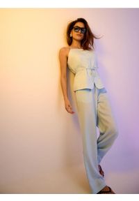 Sinsay - Spodnie wide leg z wiskozą - błękitny. Kolor: niebieski. Materiał: wiskoza #1