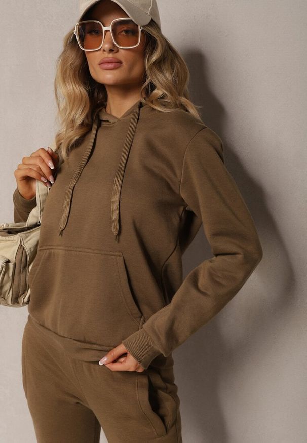 Renee - Ciemnozielona Bluza z Kapturem Corbetes. Typ kołnierza: kaptur. Kolor: zielony. Materiał: polar, tkanina, dresówka, prążkowany. Długość rękawa: długi rękaw. Długość: długie. Wzór: jednolity, gładki