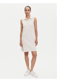 Puma Sukienka codzienna Ess Elevated 685029 Beżowy Relaxed Fit. Okazja: na co dzień. Kolor: beżowy. Materiał: bawełna. Typ sukienki: proste. Styl: casual