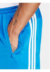 Adidas - adidas Spodnie dresowe adicolor Classics Adibreak IM8224 Niebieski Regular Fit. Kolor: niebieski. Materiał: syntetyk #3