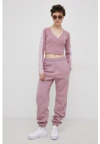 adidas Originals Spodnie damskie kolor różowy gładkie. Kolor: różowy. Materiał: dzianina, poliester, bawełna. Wzór: gładki