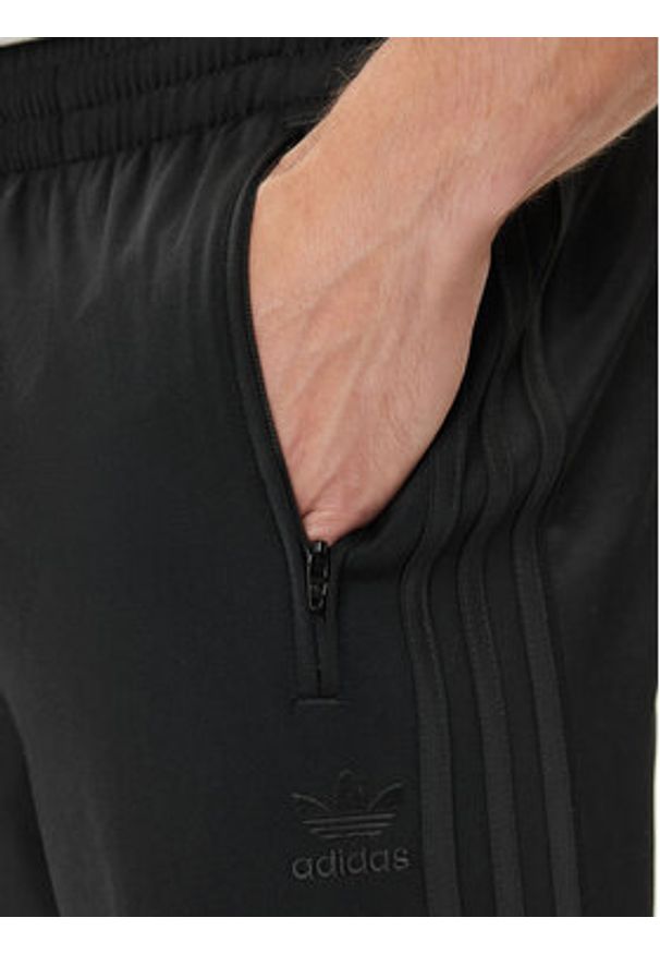 Adidas - adidas Spodnie dresowe adicolor Classics Firebird JY1350 Czarny Regular Fit. Kolor: czarny. Materiał: syntetyk