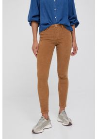 TOMMY HILFIGER - Tommy Hilfiger spodnie sztruksowe damskie kolor brązowy dopasowane medium waist. Kolor: brązowy. Materiał: sztruks
