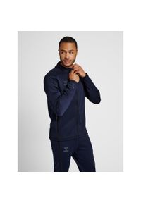 Bluza dresowa zapinana na zamek błyskawiczny Hummel Cima XK. Kolor: niebieski. Materiał: dresówka. Wzór: nadruk. Sport: piłka ręczna #1