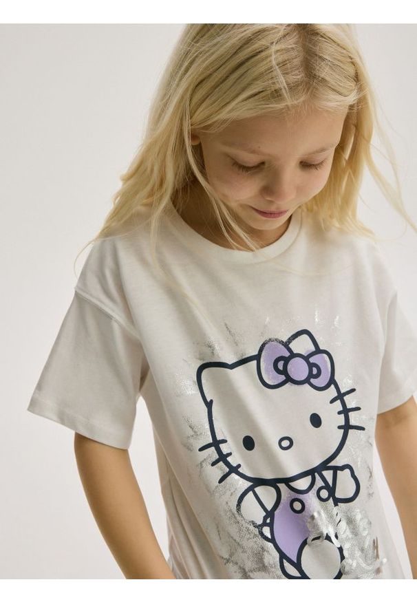 Reserved - T-shirt Hello Kitty - złamana biel. Materiał: bawełna. Wzór: motyw z bajki