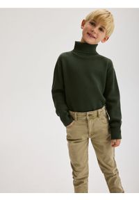 Reserved - Elastyczne spodnie slim - beżowy. Kolor: beżowy. Materiał: tkanina, włókno, bawełna #1