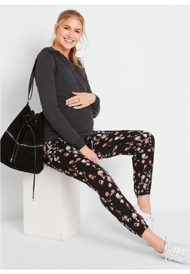 bonprix - Lekkie spodnie ciążowe z wiskozy, Loose Fit. Kolekcja: moda ciążowa. Kolor: czarny. Materiał: wiskoza. Wzór: kwiaty