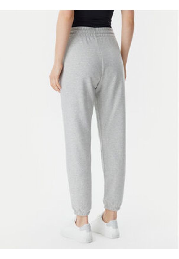 GAP - Gap Spodnie dresowe 889527-01 Szary Relaxed Fit. Kolor: szary. Materiał: bawełna