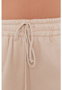 Answear Lab Spodnie damskie kolor beżowy gładkie. Kolor: beżowy. Materiał: dzianina. Wzór: gładki