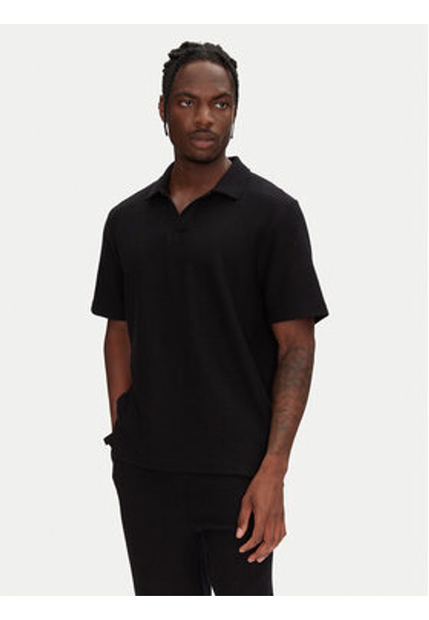 Jack & Jones - Jack&Jones Komplet polo i spodenki Slington 12281841 Czarny Relaxed Fit. Kolor: czarny. Materiał: bawełna