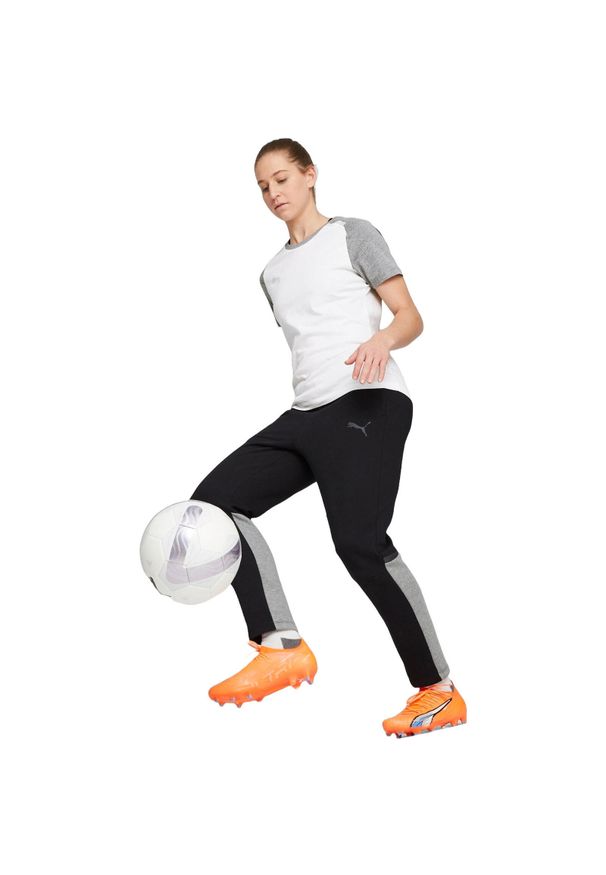 Puma - damskie TeamCUP Casuals Pants. Kolor: czarny. Materiał: bawełna, materiał. Sport: fitness