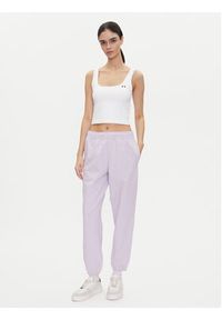 Calvin Klein Jeans Spodnie dresowe Monologo LV047B235G Fioletowy Regular Fit. Kolor: fioletowy. Materiał: bawełna #4