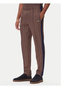 Lacoste Spodnie dresowe XH1440 Brązowy Regular Fit. Kolor: brązowy. Materiał: bawełna