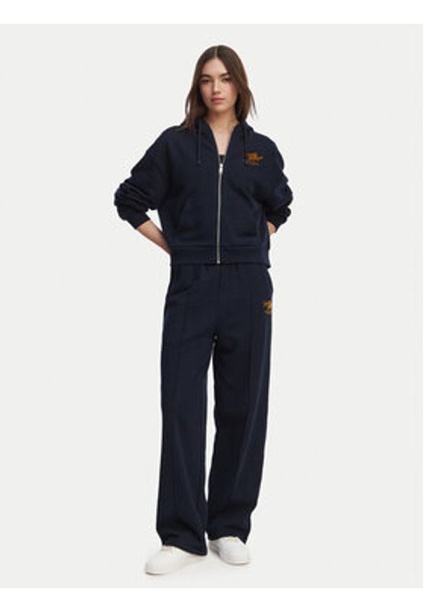 TOMMY HILFIGER - Tommy Hilfiger Spodnie dresowe Logo Exaggerated Seam WW0WW50783 Granatowy Relaxed Fit. Kolor: niebieski. Materiał: bawełna
