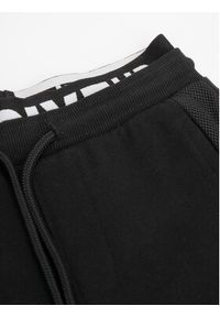 COCCODRILLO - Coccodrillo Spodnie dresowe ZC3120102MBK Czarny Slim Fit. Kolor: czarny. Materiał: dresówka, bawełna
