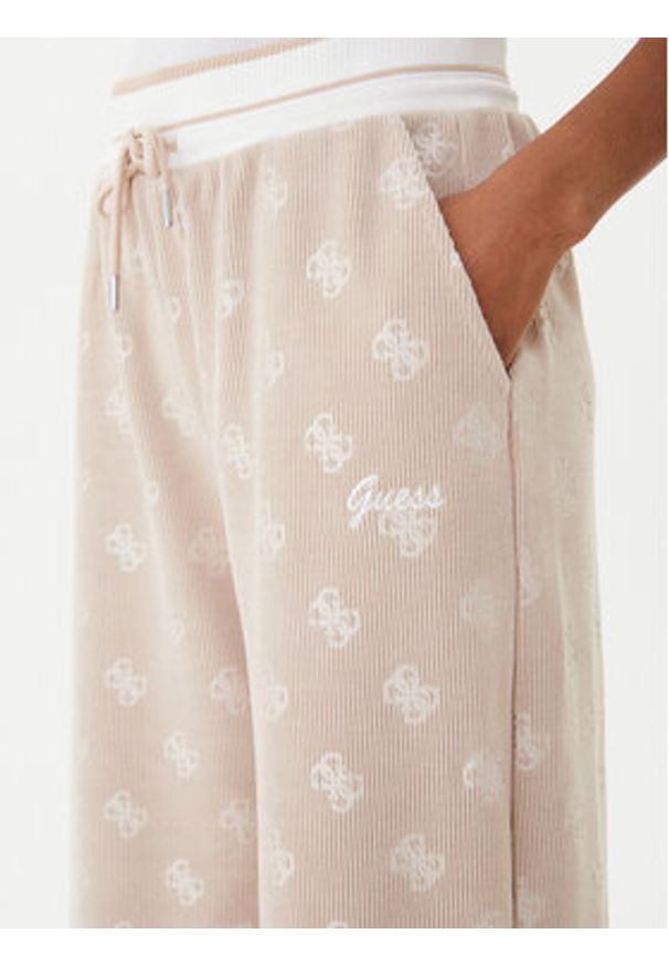 Guess Spodnie dresowe V5BB00 K1902 Brązowy Wide Leg. Kolor: brązowy. Materiał: syntetyk