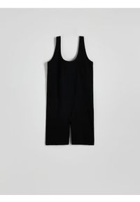 Reserved - Dopasowany kombinezon - czarny. Kolor: czarny. Materiał: dzianina. Wzór: gładki. Typ sukienki: dopasowane #1
