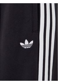 Adidas - adidas Spodnie dresowe adicolor 3-Stripes JV7473 Czarny Wide Leg. Kolor: czarny. Materiał: bawełna #2