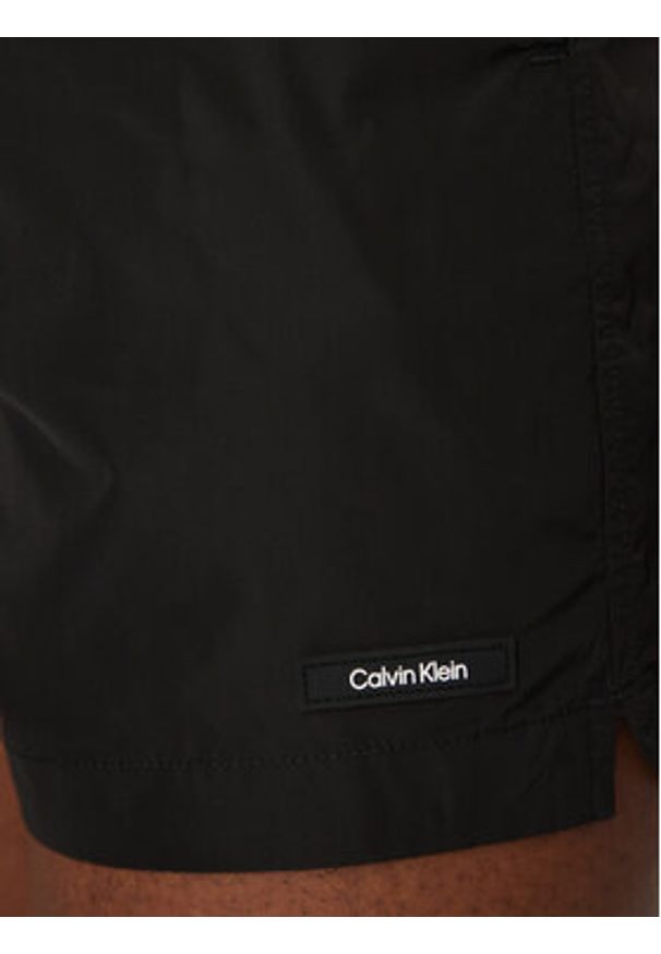 Calvin Klein Swimwear Szorty kąpielowe KM0KM01111 Czarny Regular Fit. Kolor: czarny. Materiał: syntetyk