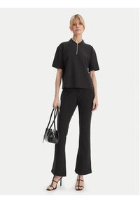 Calvin Klein Polo LV044E241G Czarny Relaxed Fit. Typ kołnierza: polo. Kolor: czarny. Materiał: syntetyk #2