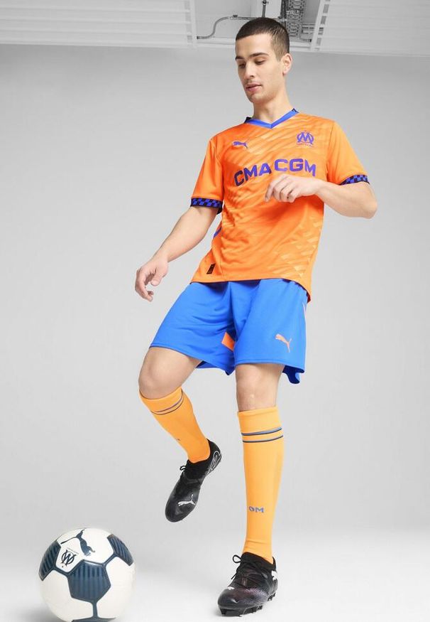 Puma - Męskie szorty Olympique Marsylia 24/25 PUMA Racing Blue Fluro Orange Pes. Kolor: żółty, pomarańczowy, wielokolorowy, niebieski. Sport: piłka nożna