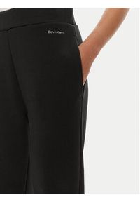 Calvin Klein Spodnie dresowe Nano Logo K20K207214 Czarny Relaxed Fit. Kolor: czarny. Materiał: bawełna #3