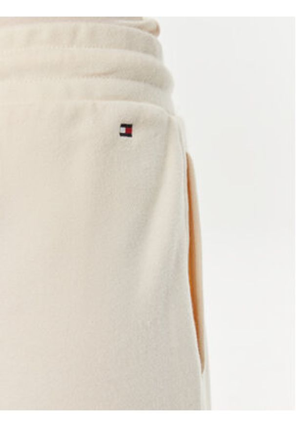 TOMMY HILFIGER - Tommy Hilfiger Spodnie dresowe Monotype WW0WW41572 Beżowy Regular Fit. Kolor: beżowy. Materiał: bawełna