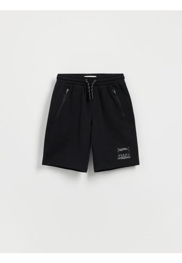 Reserved - Szorty bermudy - czarny. Kolor: czarny. Materiał: bawełna, dzianina. Wzór: melanż
