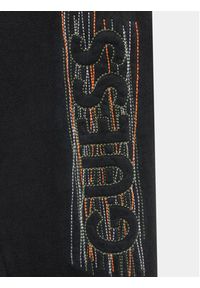 Guess Spodnie dresowe L3BQ12 KAD74 Czarny Relaxed Fit. Kolor: czarny. Materiał: bawełna #2