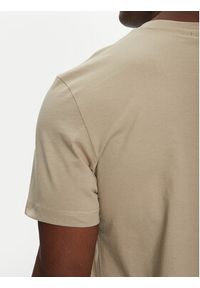 Calvin Klein Jeans T-Shirt Monologo J30J325649 Beżowy Regular Fit. Kolor: beżowy. Materiał: bawełna