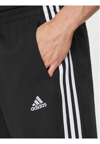 Adidas - adidas Szorty sportowe Essentials 3-Stripes Shorts IC9378 Czarny Regular Fit. Kolor: czarny. Materiał: bawełna. Styl: sportowy