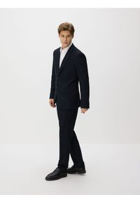 Reserved - Spodnie garniturowe z wiskozą - granatowy. Kolor: niebieski. Materiał: wiskoza #1