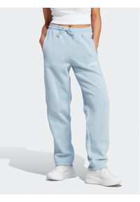 Adidas - adidas Spodnie dresowe All SZN Fleece Graphic IL3244 Błękitny Loose Fit. Kolor: niebieski. Materiał: bawełna #1