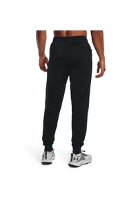 Spodnie treningowe męskie Under Armour Fleece Joggers Loose. Kolor: czarny, biały, wielokolorowy. Materiał: bawełna. Sport: turystyka piesza