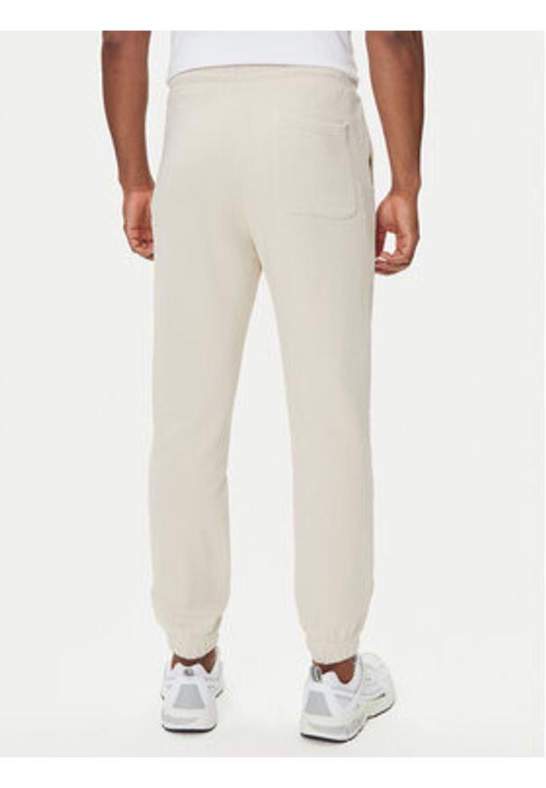 Jack & Jones Spodnie dresowe Kane Soho 12278943 Beżowy Regular Fit. Kolor: beżowy. Materiał: bawełna