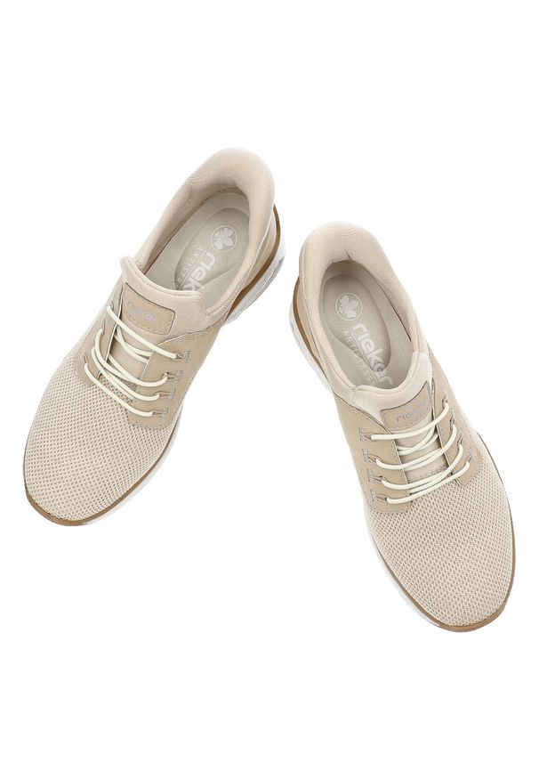 Beżowe Sneakersy Rieker Stylowe Wsuwane Obuwie Damskie. Okazja: na co dzień. Zapięcie: bez zapięcia. Kolor: beżowy. Materiał: materiał. Szerokość cholewki: normalna. Sport: turystyka piesza