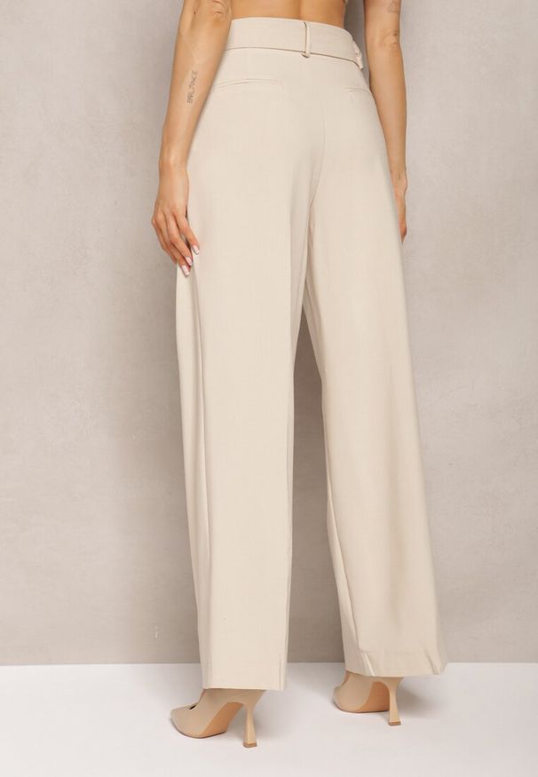Renee - Beżowe Spodnie Szerokie High Waist Zapinane na Klamrę z Materiałowym Paskiem Etela. Okazja: na co dzień. Stan: podwyższony. Kolor: beżowy. Materiał: materiał. Styl: casual, elegancki