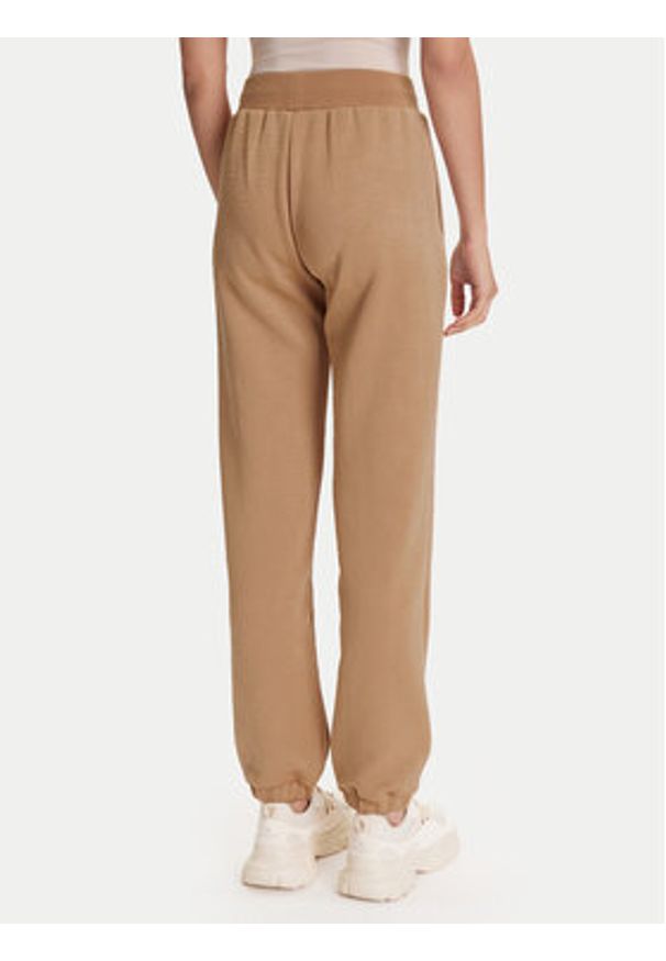 Guess Spodnie dresowe V5YB06 KBSL2 Beżowy Regular Fit. Kolor: beżowy. Materiał: syntetyk