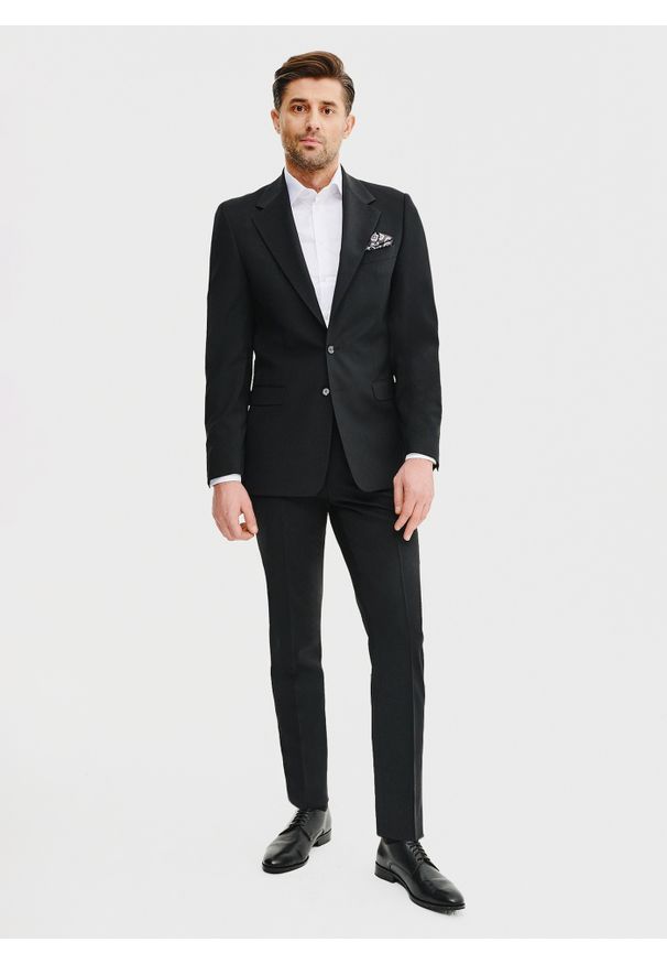 Pako Lorente - PAKO LORENTE – Wełniana marynarka garniturowa w kolorze czarnym. Okazja: na spotkanie biznesowe. Kolor: czarny. Materiał: wełna. Wzór: gładki. Styl: biznesowy