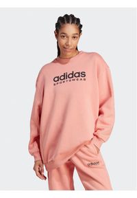 Adidas - adidas Bluza ALL SZN Fleece Graphic IL3242 Pomarańczowy Loose Fit. Kolor: pomarańczowy. Materiał: bawełna