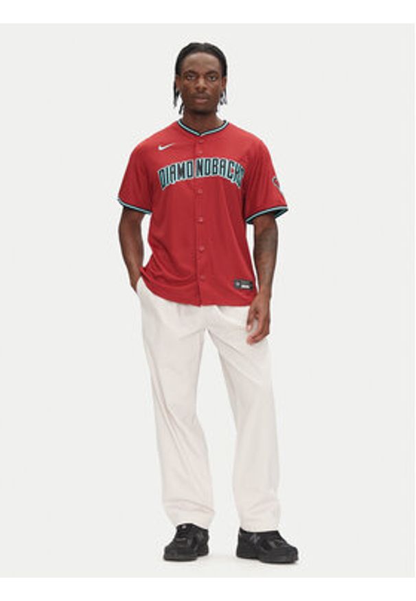 Nike T-Shirt LM25-DKA2-DQS-1U2 Bordowy Regular Fit. Kolor: czerwony. Materiał: syntetyk