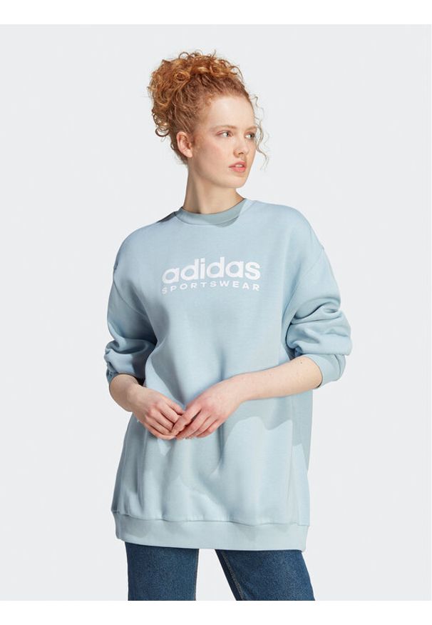 Adidas - adidas Bluza ALL SZN Fleece Graphic IL3248 Błękitny Loose Fit. Kolor: niebieski. Materiał: bawełna