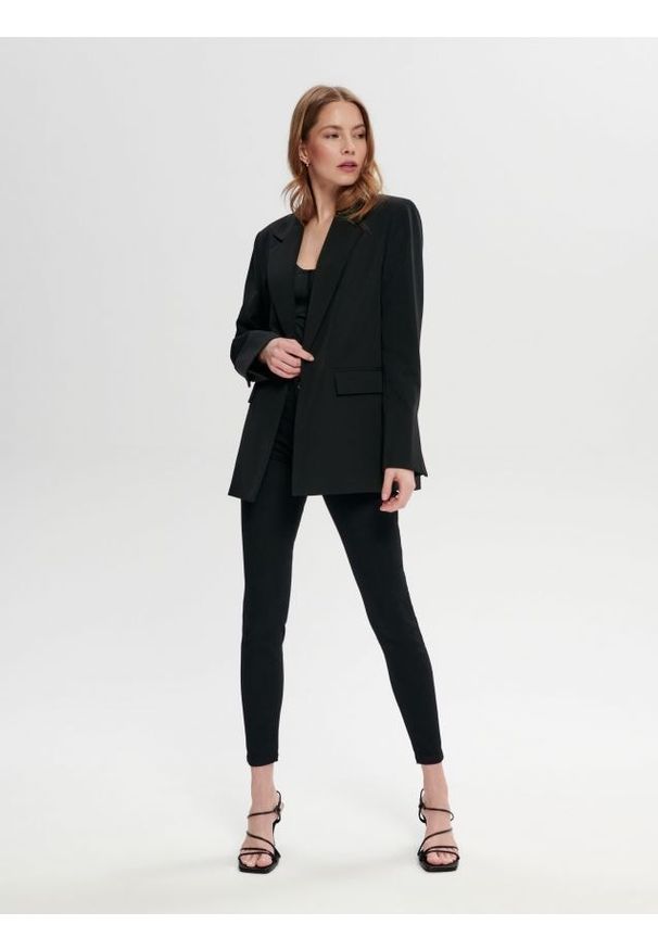 Sinsay - Jeansy skinny mid waist - czarny. Kolor: czarny