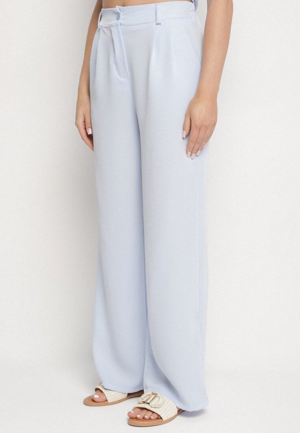 Born2be - Niebieski Komplet Koszula z Asymetrycznym Wiązaniem i Szerokie Spodnie Filivara. Kolor: niebieski