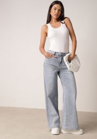 Born2be - Niebieskie Jeansy o Szerokim Fasonie z Wysokim Stanem Zdobione Haftem Liluth. Okazja: na co dzień, na spotkanie biznesowe, do pracy. Stan: podwyższony. Kolor: niebieski. Wzór: aplikacja, haft. Styl: casual, biznesowy, elegancki, klasyczny #4