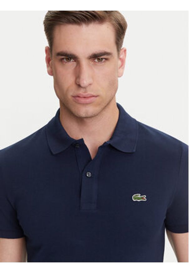 Lacoste Polo PH4012 Granatowy Slim Fit. Typ kołnierza: polo. Kolor: niebieski. Materiał: bawełna